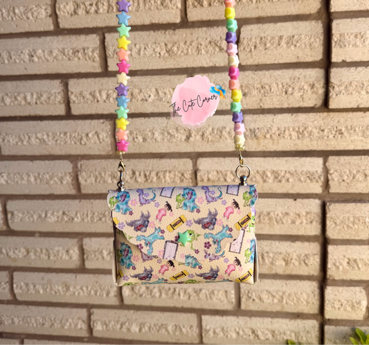 BEIGE MONSTER INC PURSE