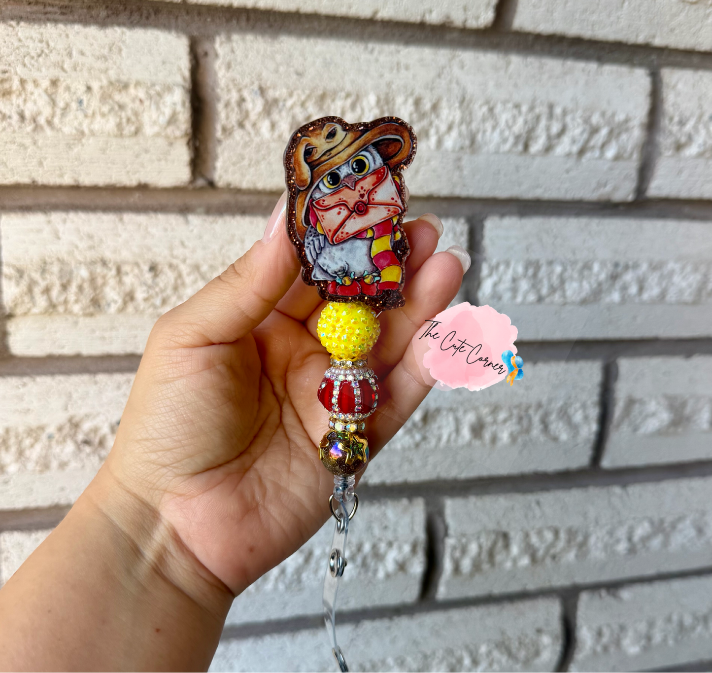 HEDWIG BADGE REEL
