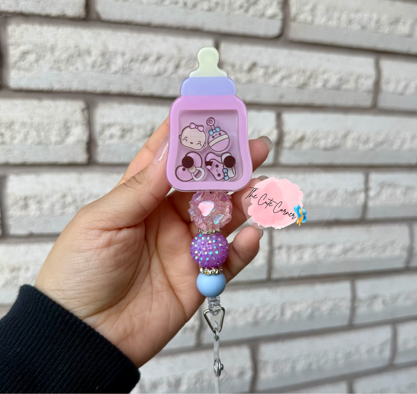 NICU BOTTLE SHAKER BADGE REEL