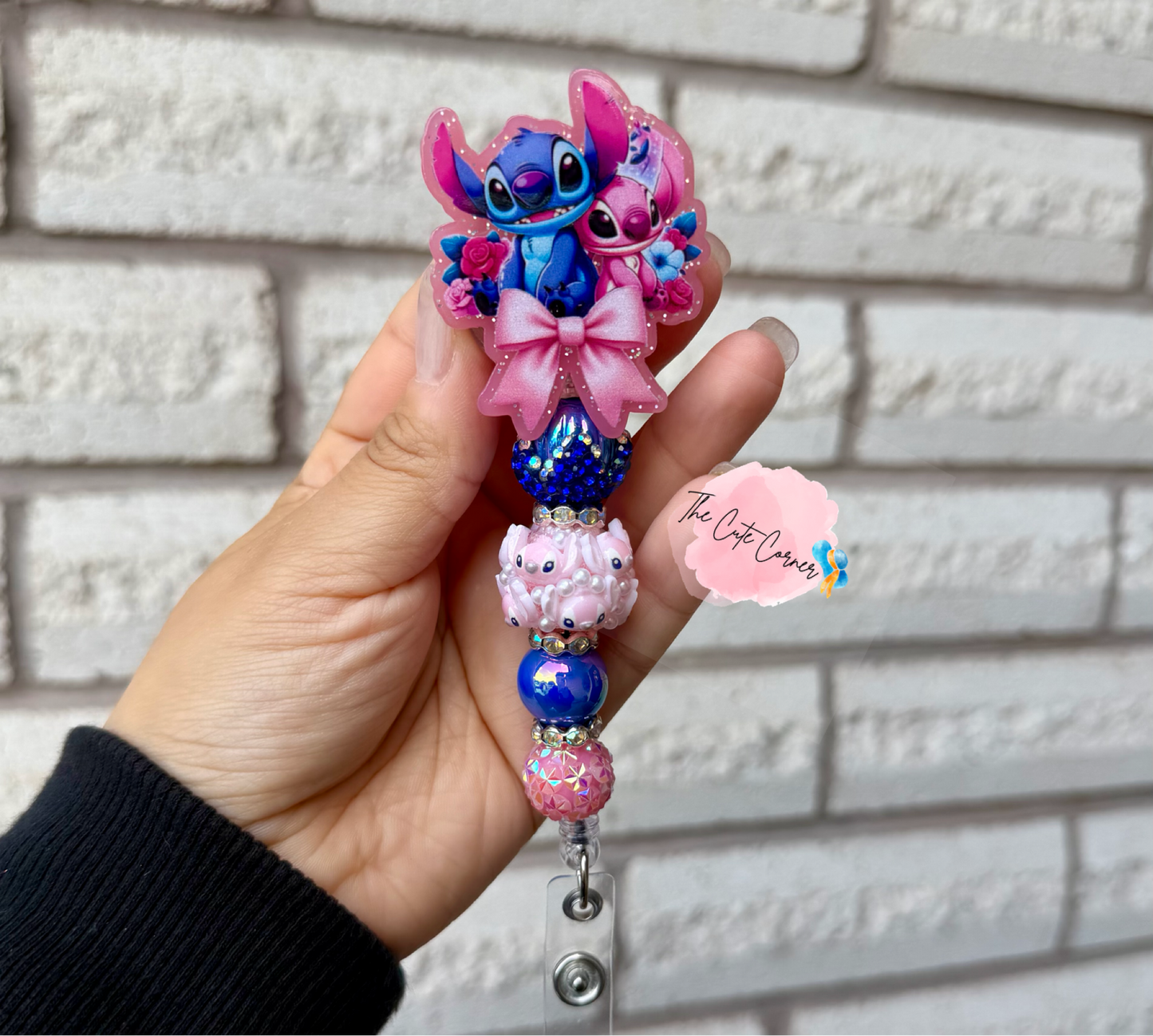 STITCH BOW BADGE REEL