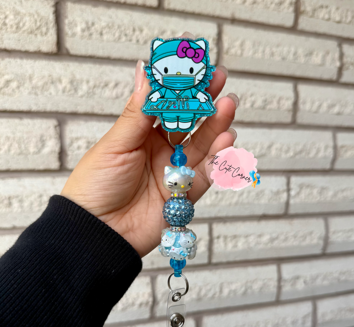 HELLO KITTY SURGEON BADGE REEL